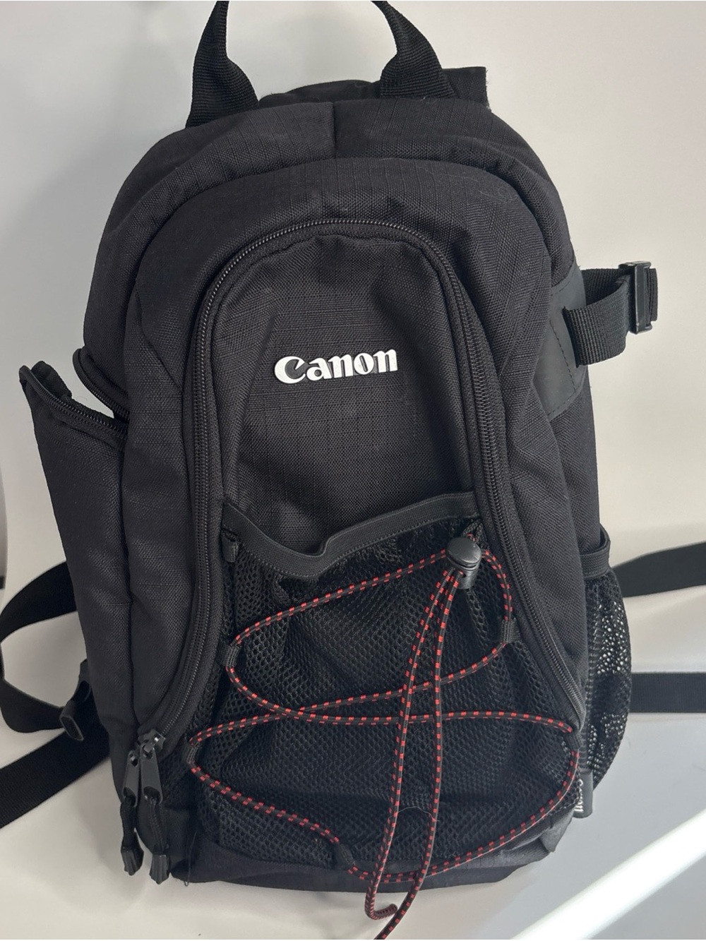 Canon Black Backpack with Red Accent Cord